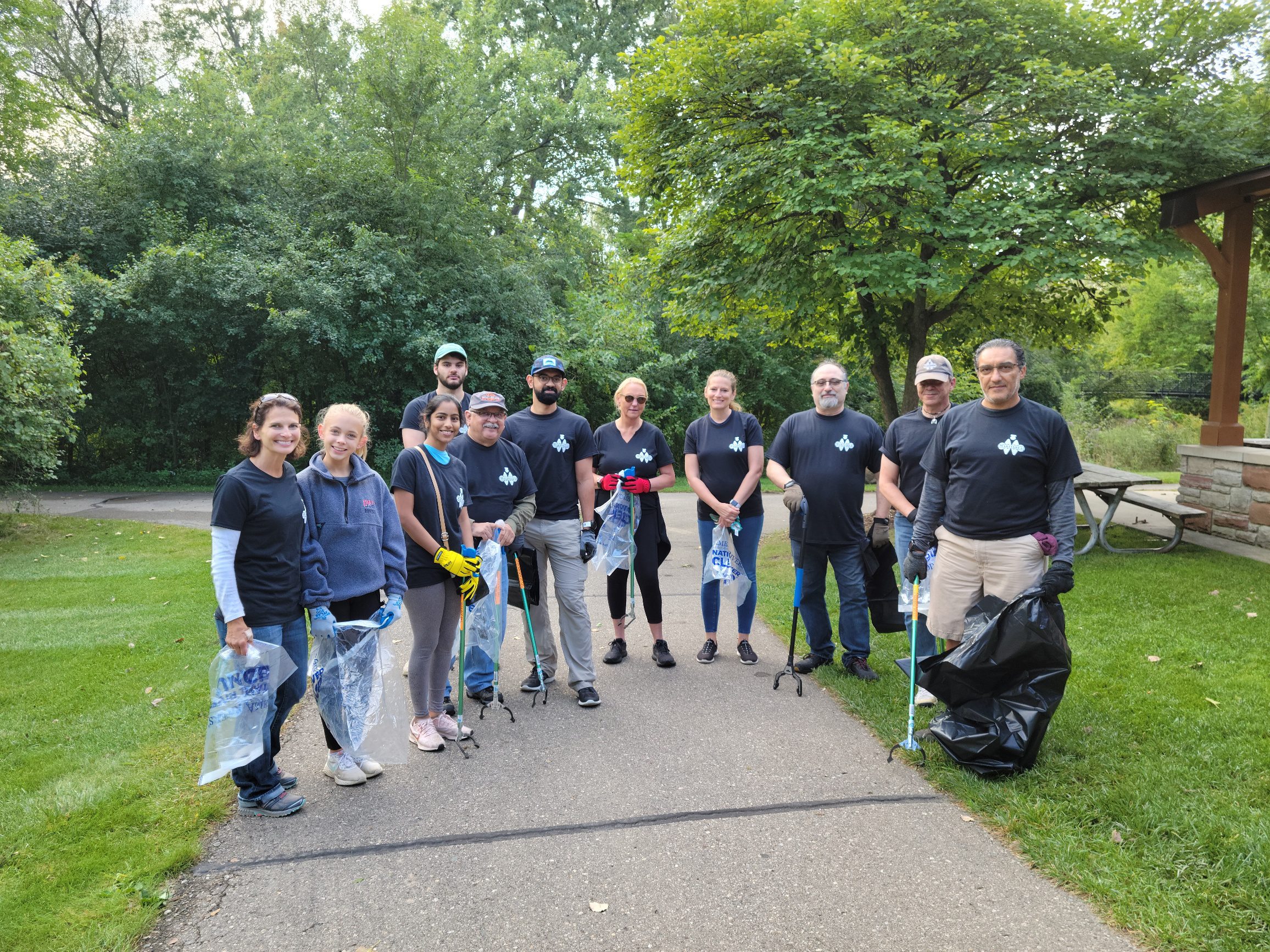 Employees volunteering in Clinton River Cleanup